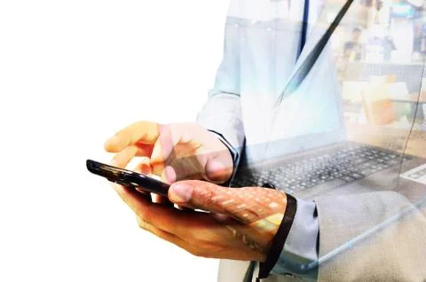 Double exposure of Business Man using Mobile Phone with Notebook or laptop co Stock Photos
