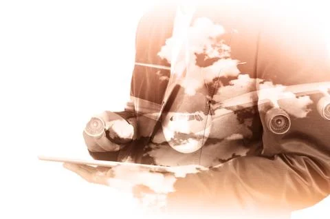 Double Exposure of Businessman use Computer Tablet with Airplane and Cloud Sk Stock Photos