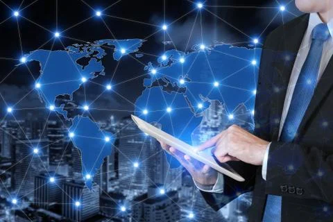 Double exposure of businessman using digital tablet connecting global busines Stock Photos