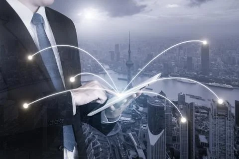 Double exposure of businessman using digital tablet pc with network connectio Stock Photos