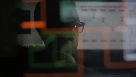 Double exposure: businessman working at computer with diagram Stock Footage 69074462