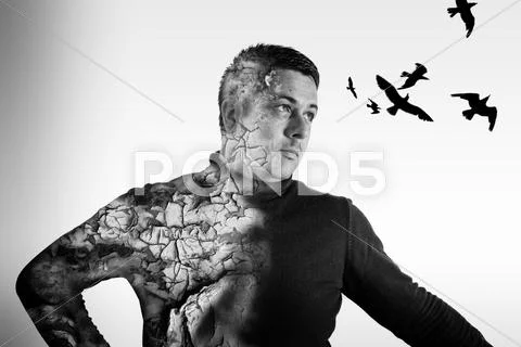 Double exposure effect of a young man standing with textured body as he watch Stock Photos