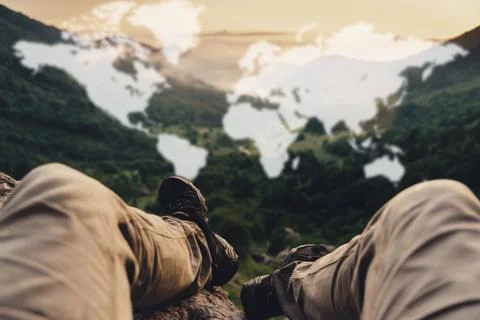 Double exposure of explorer man and map. Stock Photos