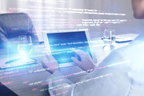 Double exposure of female programmer using tablet and source code written in  Stock Photos