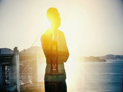 Double exposure of Golden Gate Bridge San Francisco USA city and on the phone Stock Footage 82441833
