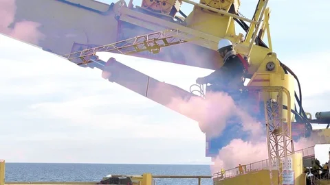 Double exposure man operate crane in red cloud sky for logistic Stock Footage 118514185