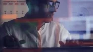 Double Exposure Shot Of Man With Glasses Working At Computer Stock Footage