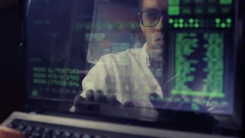 Double exposure shot of man hacker working at a laptop Vidéo 69072909