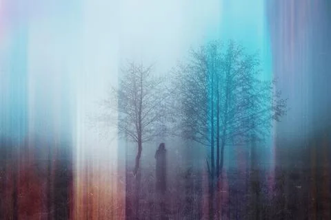A double exposure of a spooky half transparent hooded figure. Over layered Stock Photos