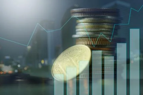 Double exposure of stacked of coins with graph and night city, concept as f.. Stock Photos