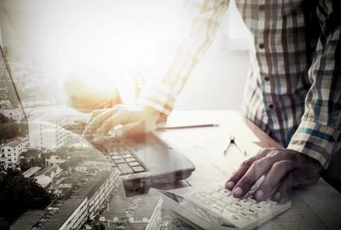 Double exposure of success land developer working in office Stock Photos