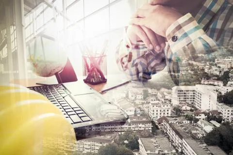 Double exposure of success land developer working in office Stock Photos