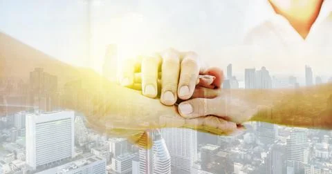 Double exposure Teamwork business join hand together concept, Image of shak.. Stock Photos