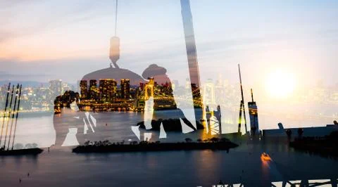Double exposure of worker in construction site with city Stock Photos