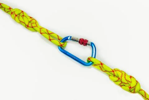 Double Flemish loop or figure eight 8 knot with new colored aluminum carabiner Stock Photos