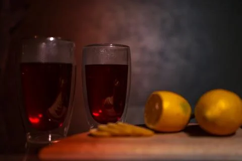 Double glass in a cup of tea Stock Photos