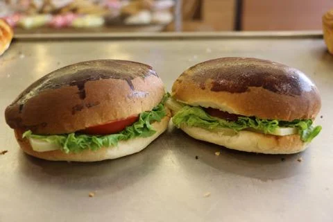 Double Hamburger with Plenty of Ingredients Stock Photos