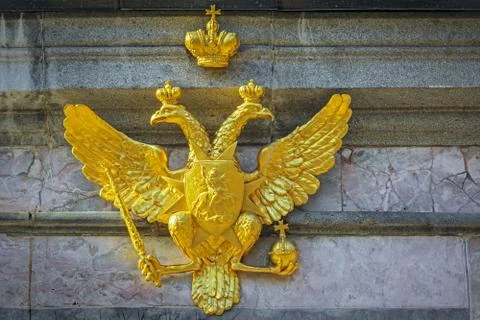Double-headed gilded eagle. Stock Photos