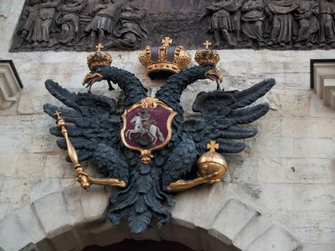 The double-headed imperial eagle over the gates in the Peter and Paul Fortres Stock Photos