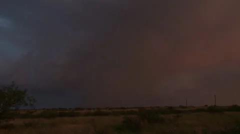 Double lightning strikes at dusk from thunderstorm. Video stock 11406867