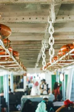Double line of lifebuoy ring floatation inside a traveler ship . Foto stock