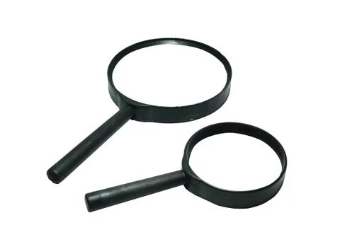 Double magnifying glasses on white background Stock Photos