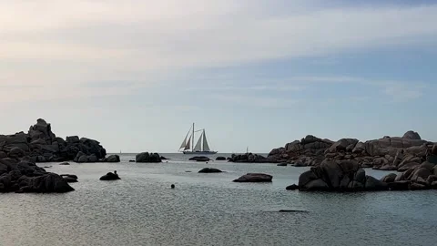 Double mast sailing ship at cala della chiesa in corsica Stock Footage 278844577