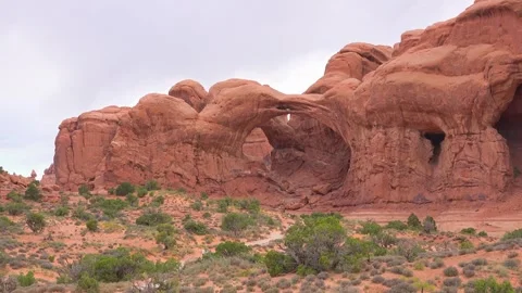Double O Arch in Arches National Park at Moab, Utah.  Exclusive Stock Footage 252134465