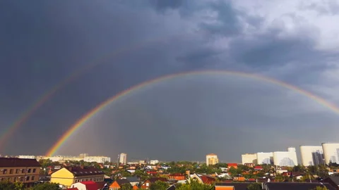Double rainbow appeared over the urban landscape Stock Footage 201259522