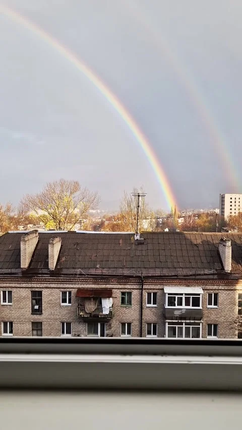 Double Rainbow Arcs Over City Rooftops After Rain Stock Footage 325223202