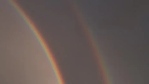 A double rainbow in the dark Video stock 334681194