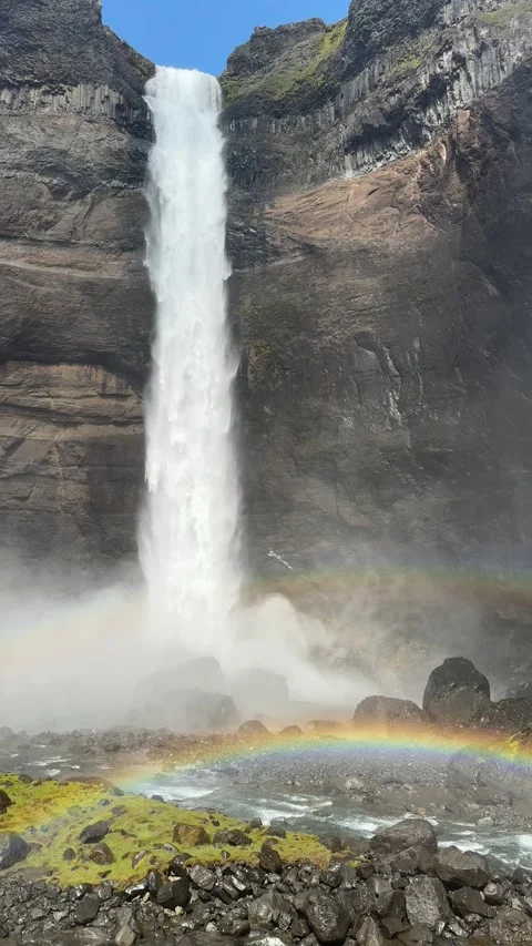 Double rainbow forms in the mist of Háifoss waterfall near Hekla volcano Stock Footage 312232741