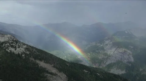 Double rainbow in the mountains Stock Footage 58029743