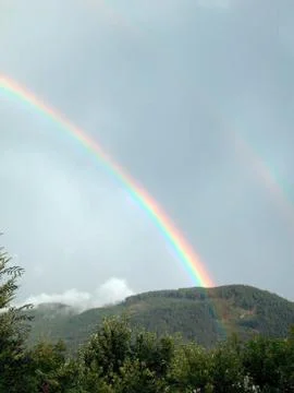 Double rainbow in the mountains Stock Photos