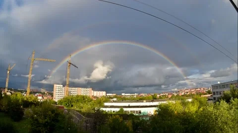 Double rainbow over the city Stock Footage 49349697