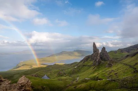 Double rainbow over old man of storr. landscape and travel concept Stock Photos