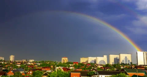 Double rainbow over urban landscape Stock Footage 201259404