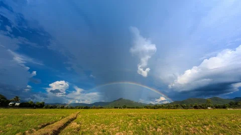 Double Rainbows On Rainy Sky 4K Time Lapse Stock Footage 76614008