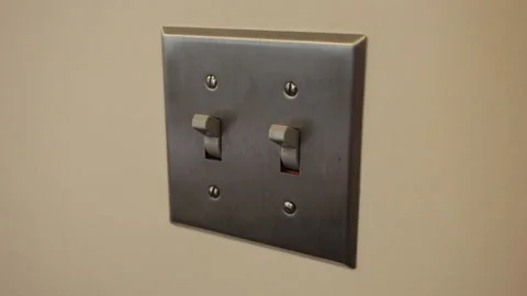 Double school light switch being shut off Stock Footage 141582918