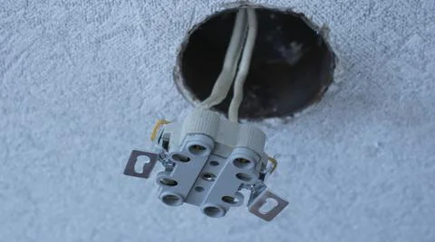 Double socket attached to long wires close-up Stock Photos