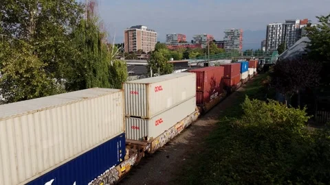 Double-stack Intermodal Freight Train In Vancouver, BC, Canada. - aerial ascend 스톡 동영상 327720393