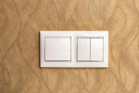 Double switch on the texture wall in the apartment. Foto stock