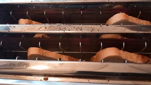 Double Toaster with Bread- Lever Click, Heat Hum, Wire Rack Clang - Top-Down Vie Stock Footage 336946575