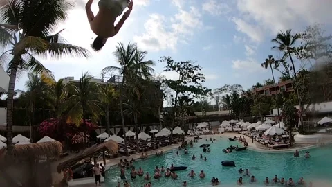 Double Twisting Backflip Flip Into Crowded Pool Club GoPro POV Stock Footage 144046568