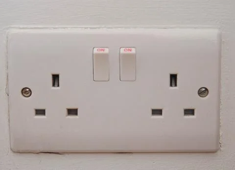 Double UK Electrical Wall Socket with Switches Turned On Stock Photos