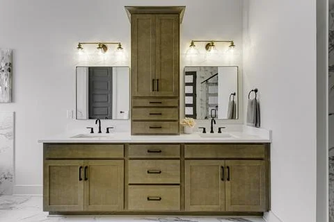 Double Vanity Bathroom With Storage Cabinets And Marble Accents Stock Photos