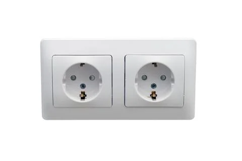 Double wall electrical outlet on white background. Plastic wall socket for in Stock Photos