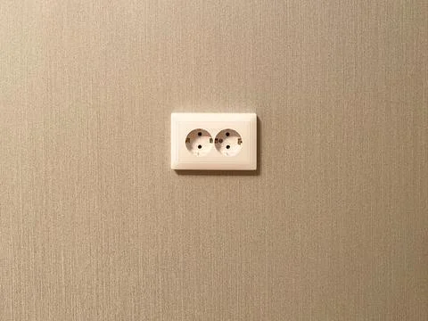 Double wall socket in white color close-up Stock Photos
