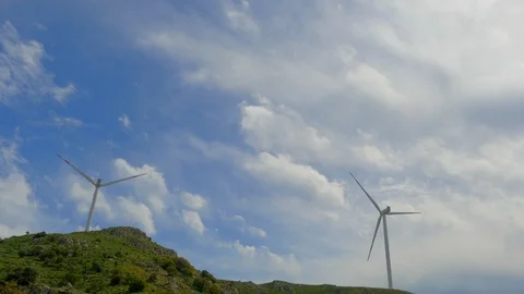 Double Wind Turbines -- Cloud Time Lapse Stock Footage 88957291