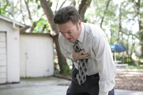 Doubled Over in Pain Stock Photos